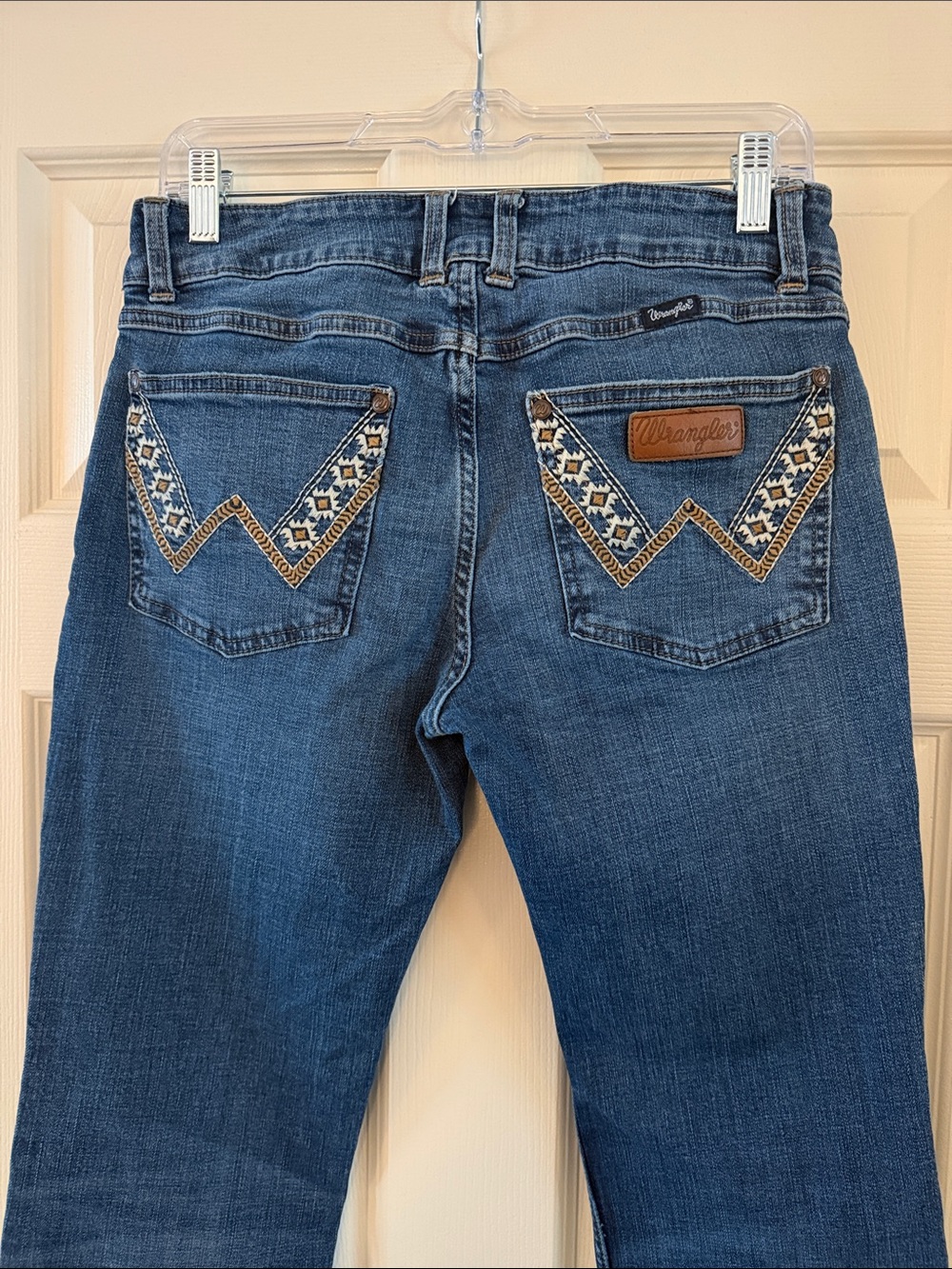 Wrangler Blue Bootcut Jeans with Embroidered Chevron Pockets